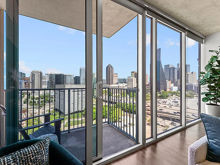 Floor-to-ceiling windows with upgraded solar shades