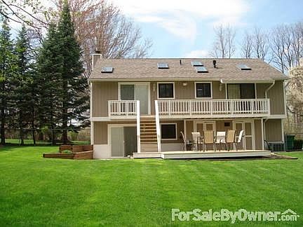 back yard 2
						:
						private fenced in back yard, multilevel deck, concrete patio, flower boxes