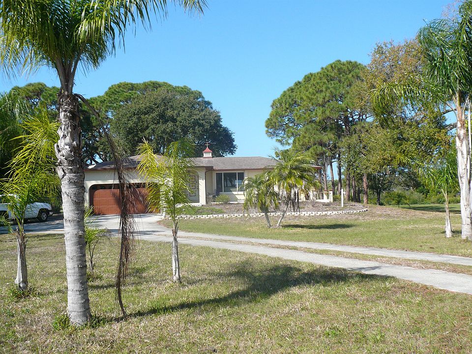 1792 SF, 3/2/2/ HOME SITUATED ON 1.87 ACRES/WATERFRONT