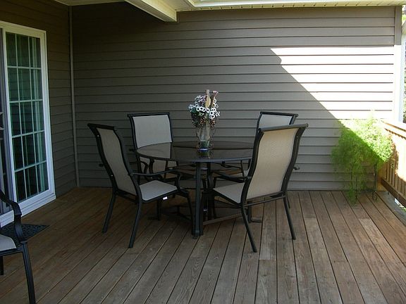 Large partially covered back porch