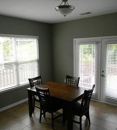 Tile floors & door to dec
