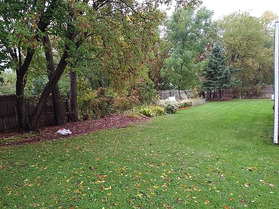 Yard 3 Season Porch Looks Out Onto Yard