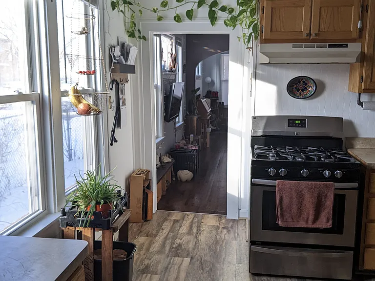 Kitchen view looking into living room