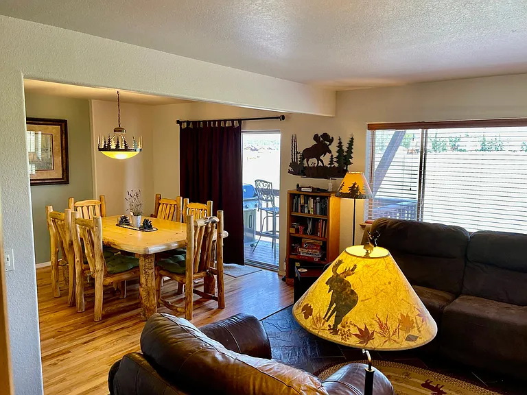 Living area with mountain and lake views