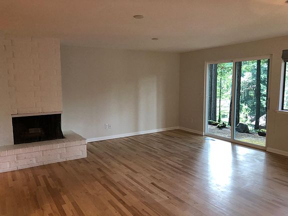 Family room next to kitchen and informal dining space (or use it for additional family room space!).