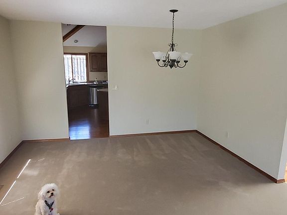 Dining area with room for a china cabinet. Poodle not included.