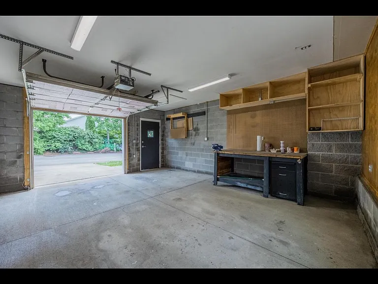 one car garage with custom tool /working shelves