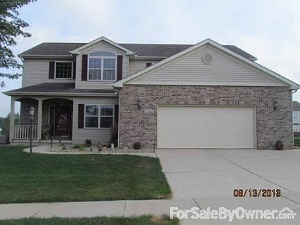 Front of House
						:
						Notice extended garage sides. 3rd car bay is behind second stall on right.