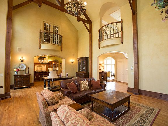 Generous Great Room opens graciously into the warm Kitchen providing the ideal setting for all your entertaining needs with the latest design trends.