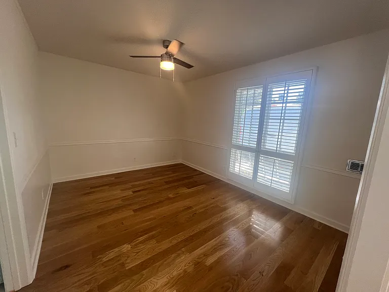 Could be a home office, dining room, or den!