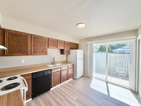 Two-Level 2BR with Fenced Yard & Washer/Dryer Hookups, 85 Castle Royal Dr, Pueblo, CO 81005