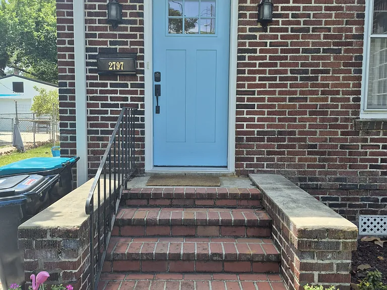 Entry with electronic coded door lock.