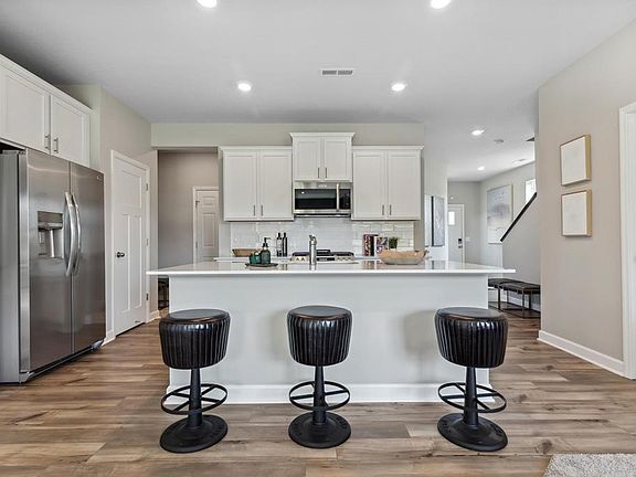 Great space around island and all new stainless steel appliances. Gas range for those cooking enthusiasts