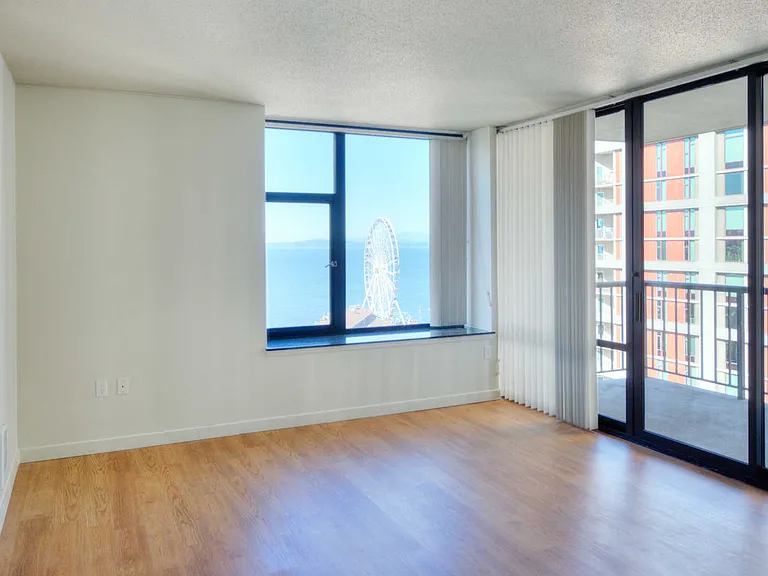 Bedroom with Balcony and Hard Surface Flooring