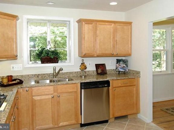 Kitchen opens to dining area