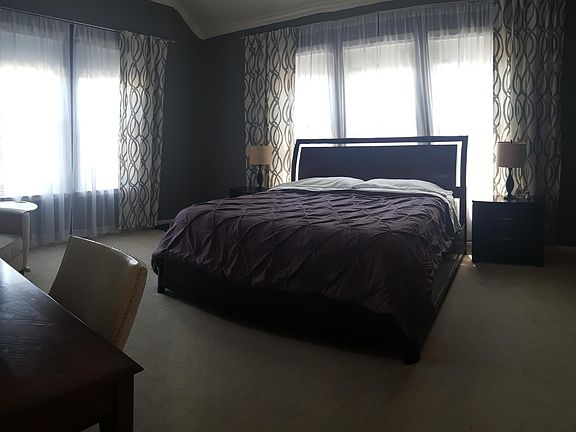 Huge Master Bedroom with room for sitting area and downtown