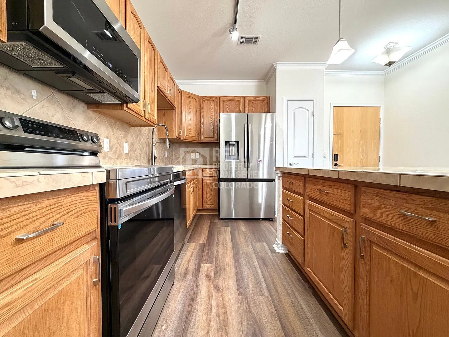 Lone Tree Condo with Mountain Views, Garage, Reserved Parking and Pool - 10184 Park Meadows Dr #1... — Photo 3