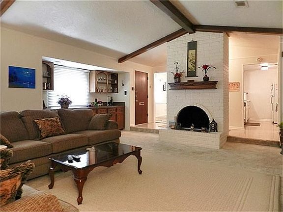 Fireplace is central.
