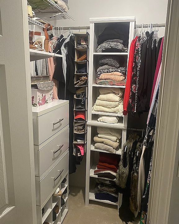 Primary bedroom closet 1