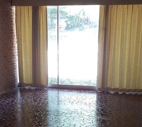 Side Entry : Den that leads to garage, backyard and the rest of the house.