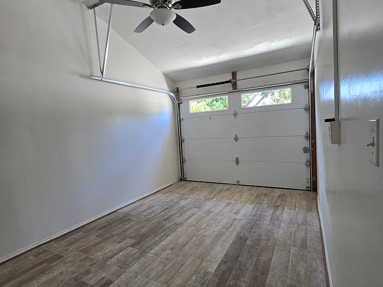 This is the finished look of the roomy titled garage area
