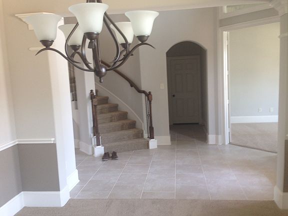 View from formal dining into foyer and office