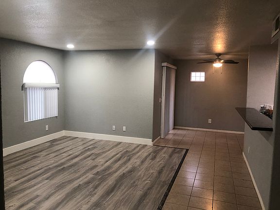 View from the main entrance door. Overlooking the Living Room and Dining Area.