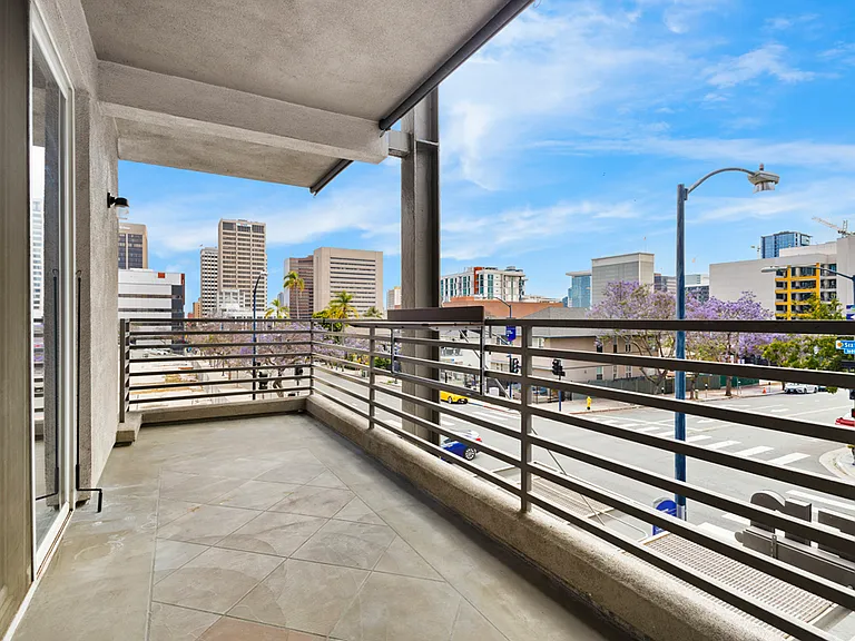 Balcony with City Views, Roller Shading and Deck Table