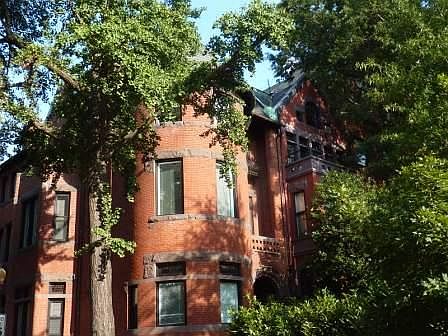The apartment occupies the ground floor of a grand historic house.
