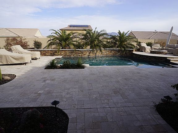 huge outdoor travertine deck