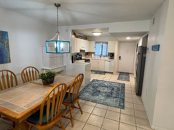 Dining room comfortably seats four people
