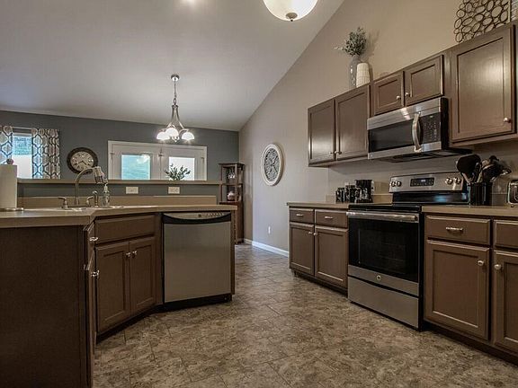 Kitchen with ceramic tile and vaulted ceilings too!