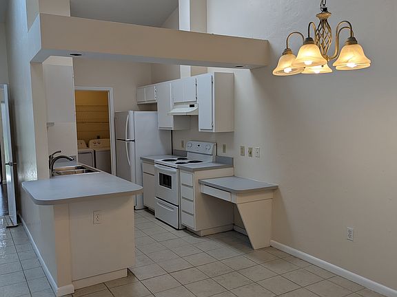 Open dining and kitchen space.