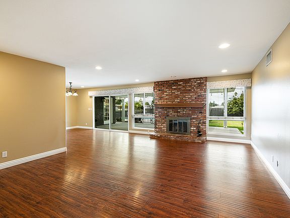Living Room with Wood Burning Fireplace