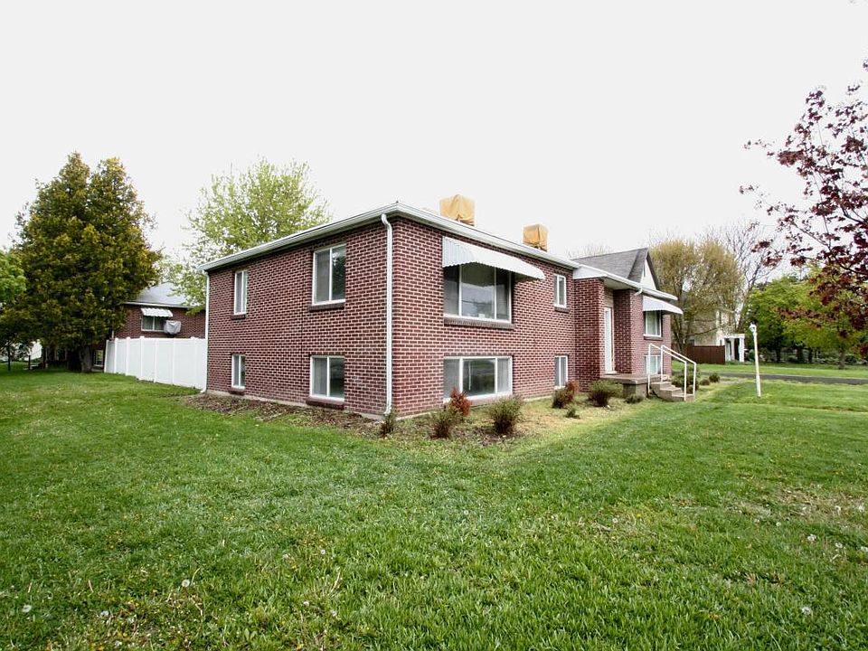 Property has a large grass front yard