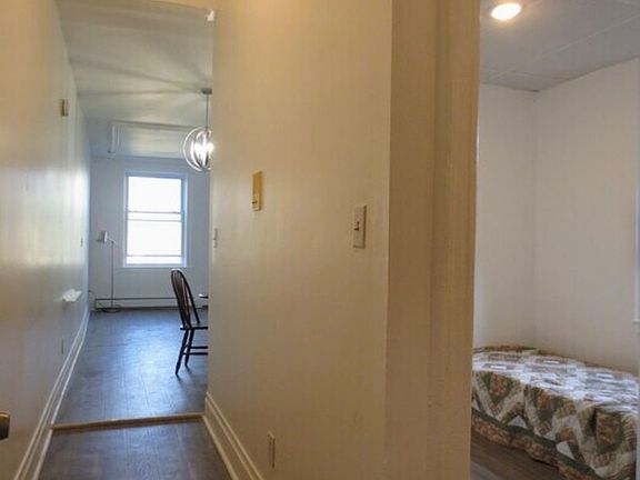 Walk into front door of apartment