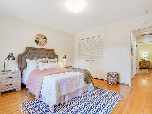 Serene 1st Bedroom. 2 Rooms separated by bathroom and hallway closets