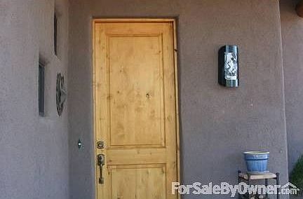 Front Entry
						:
						Front door is Knotty Alder