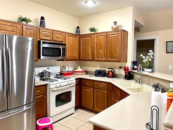 5th image of 8795 Traveling Breeze Ave Unit 102