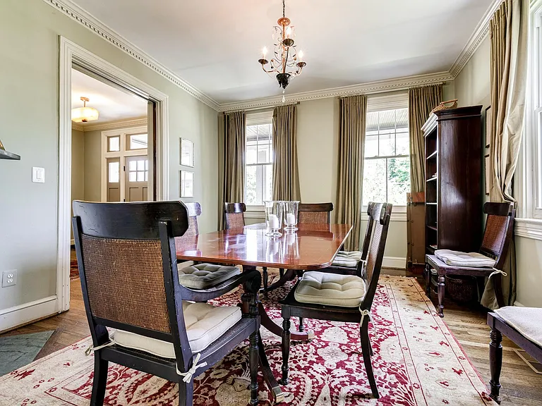 Dining Room with pocket doors. (Can also be used as a separate office or playroom as it can be closed off.)