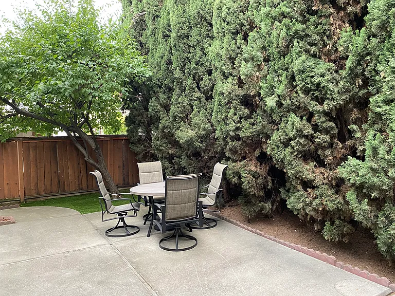 Secluded backyard with Patio furniture