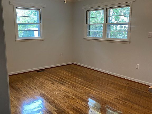 shades installed in livingroom and larger kitchen window