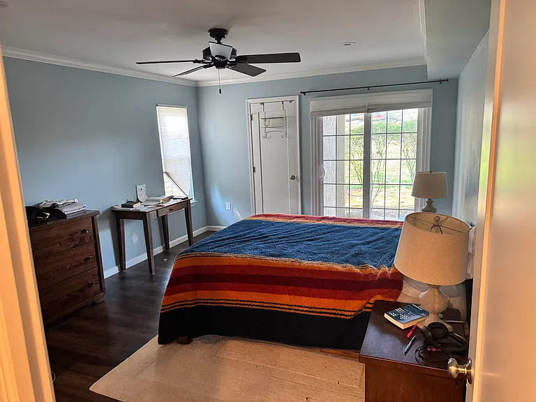 master bedroom with walk-in closet and in-suite bathroom