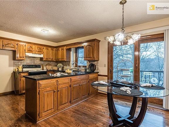 Eat in kitchen with new granite.