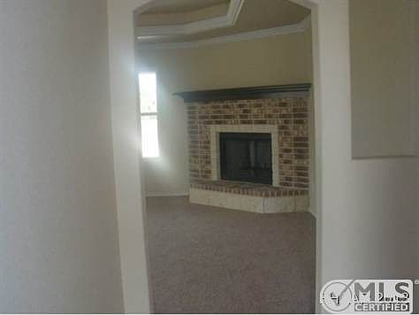 Arched doorway to living