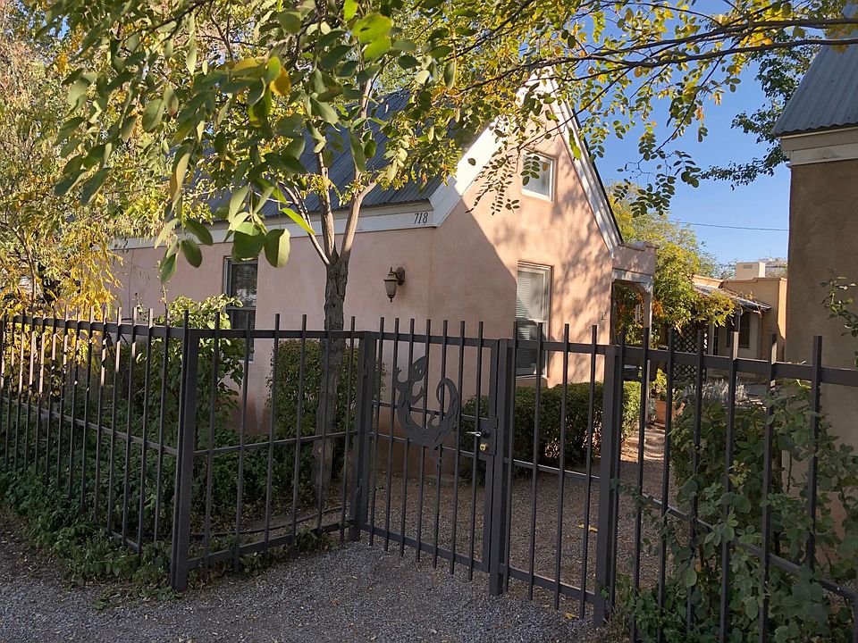 North side of front entrance to casitas through large parking area.