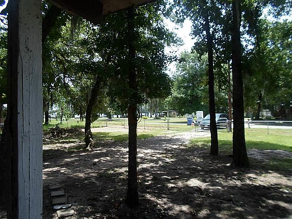 VIEW FROM PORCH, LOTS OF SHADE A BEAUTIFUL VIEW OF LAKE