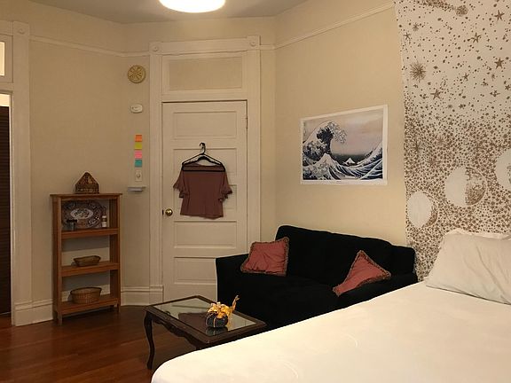 Apartment entrance door and living/sleeping area