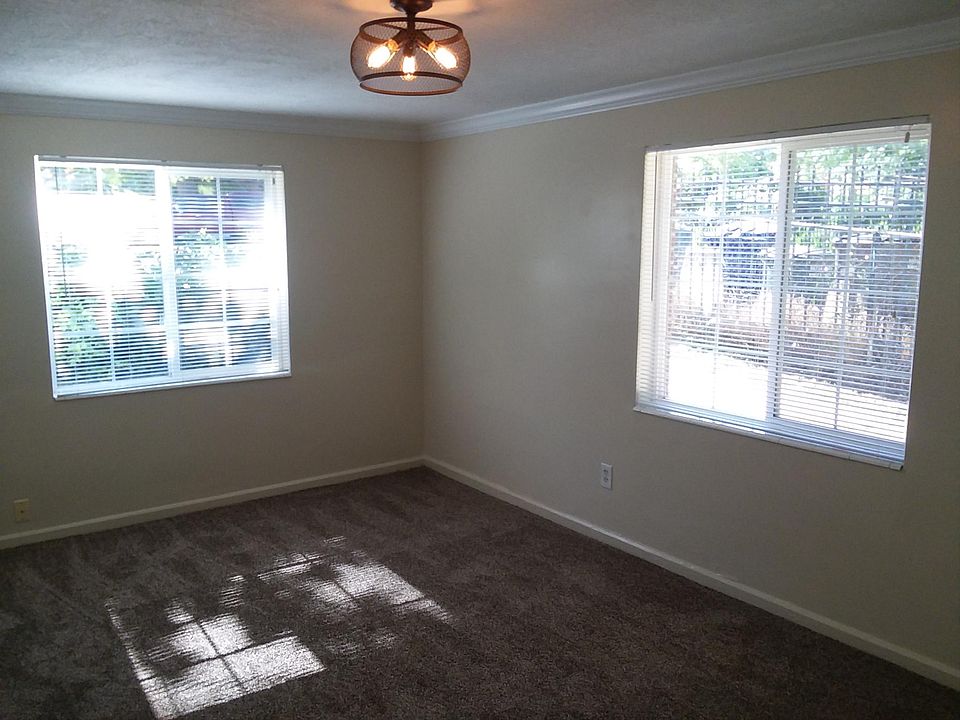 Living Room - Plenty of Natural Light with crown molding and