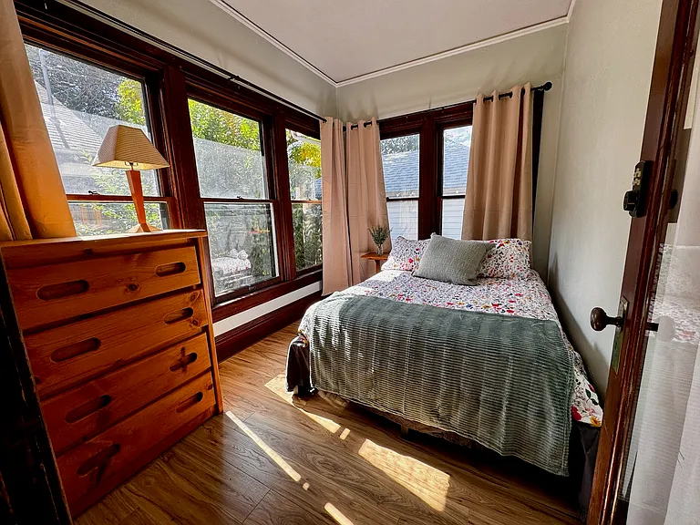 Bedroom 3: Full memory foam mattress. Large windows with beautiful lighting. Newly painted sage green. Dresser.